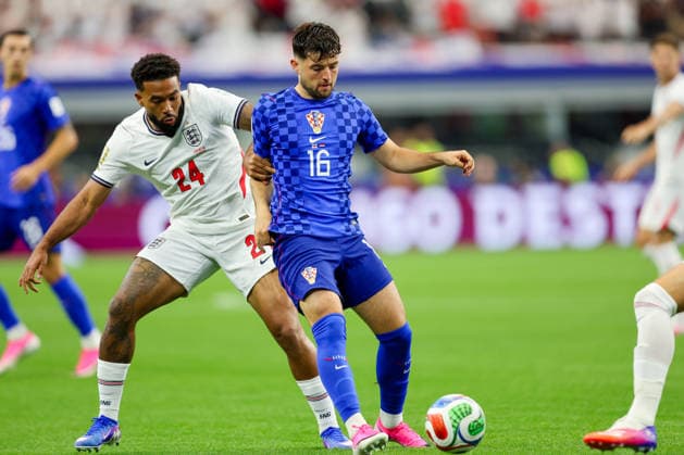 England v Croatia: Group L - FIFA World Cup, WM, Weltmeisterschaft, Fussball 2026 Reece James of England and Martin Baturina of Croatia competes for the ball during the FIFA World Cup 2026 Group L match between England and Croatia at Dallas Stadium on June 17, 2026 in Dallas, Texas.  SanjinxStrukic PIXSELL