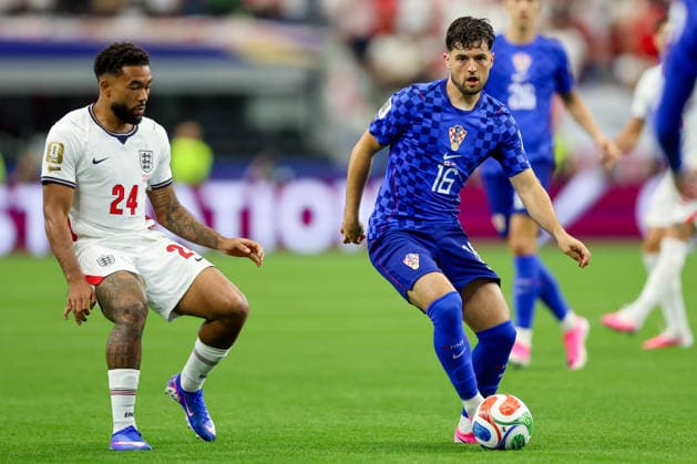 England v Croatia: Group L - FIFA World Cup, WM, Weltmeisterschaft, Fussball 2026 Reece James of England and Martin Baturina of Croatia competes for the ball during the FIFA World Cup 2026 Group L match between England and Croatia at Dallas Stadium on June 17, 2026 in Dallas, Texas.  SanjinxStrukic PIXSELL