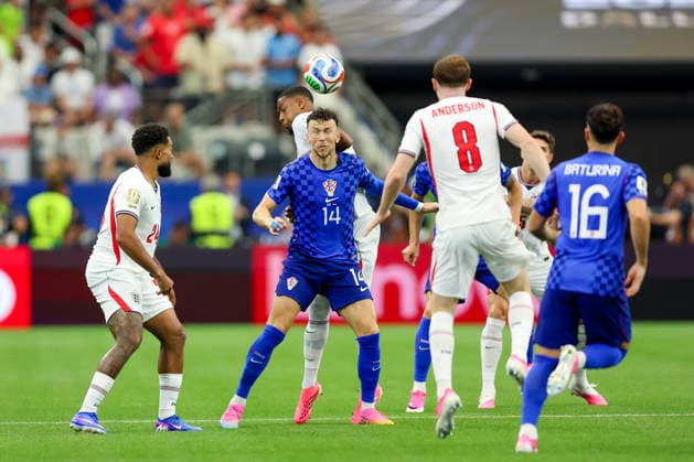 England v Croatia: Group L - FIFA World Cup, WM, Weltmeisterschaft, Fussball 2026 Ezri Konsa of England and Ivan Perisic of Croatia competes for the ball during the FIFA World Cup 2026 Group L match between England and Croatia at Dallas Stadium on June 17, 2026 in Dallas, Texas.  SanjinxStrukic PIXSELL