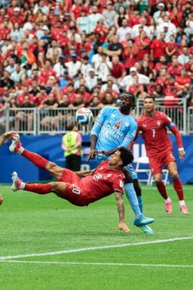 Joao Cancelo of Portugal (L) and Axel Tuanzebe of Congo DR (C) fight for possession during a FIFA Men’s World Cup 2026 Group Stage football match between Portugal and Congo DR at Houston Stadium, in Kansas City on June 17th 2026 (Photo by LVDIDI SPP)  Copyright: xLVDIDI SPPx Sportspressphoto_SPR168722
