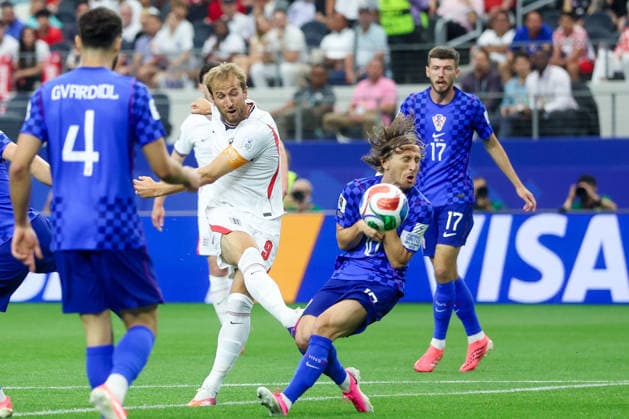 England v Croatia: Group L - FIFA World Cup, WM, Weltmeisterschaft, Fussball 2026 Luka Modric of Croatia attempts to block the shot of Harry Kane of England during the FIFA World Cup 2026 Group L match between England and Croatia at Dallas Stadium on June 17, 2026 in Dallas, Texas.  SanjinxStrukic PIXSELL