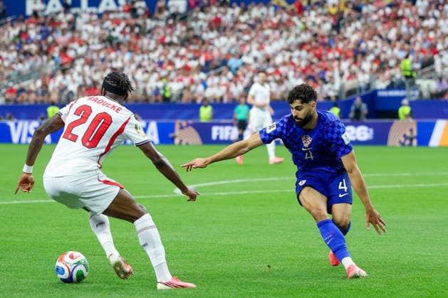 England v Croatia: Group L - FIFA World Cup, WM, Weltmeisterschaft, Fussball 2026 Noni Madueke of England in action against Josko Gvardiol of Croatia during the FIFA World Cup 2026 Group L match between England and Croatia at Dallas Stadium on June 17, 2026 in Dallas, Texas.  SanjinxStrukic PIXSELL