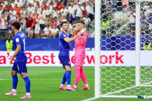 England v Croatia: Group L - FIFA World Cup, WM, Weltmeisterschaft, Fussball 2026 Ivan Perisic and Dominik Livakovic of Croatia during the FIFA World Cup 2026 Group L match between England and Croatia at Dallas Stadium on June 17, 2026 in Dallas, Texas.  SanjinxStrukic PIXSELL