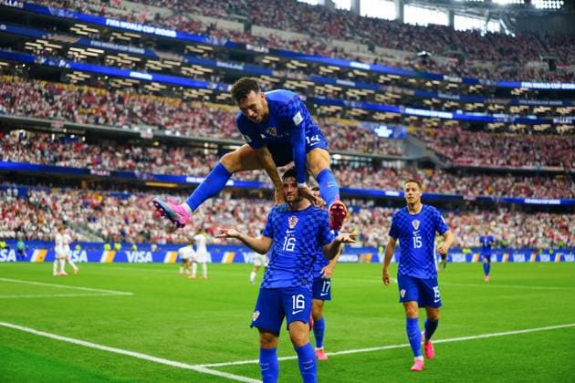 Martin Baturina celebrates scoring for Croatia with Ivan Perisic leaping over his shoulders England v Croatia, 2026 FIFA World Cup, WM, Weltmeisterschaft, Fussball Group L, Football, Dallas Stadium, Arlington, Texas, USA - 17 Jun 2026Arlington Dallas Stadium Texas (TX) United States of America EDITORIAL USE ONLY No use with unauthorised audio, video, data, fixture lists, club league logos or live services. Online in-match use limited to 120 images, no video emulation. No use in betting, games or single club league player publications.  Copyright: xJavierxGarcia Shutterstockx 16928920bm