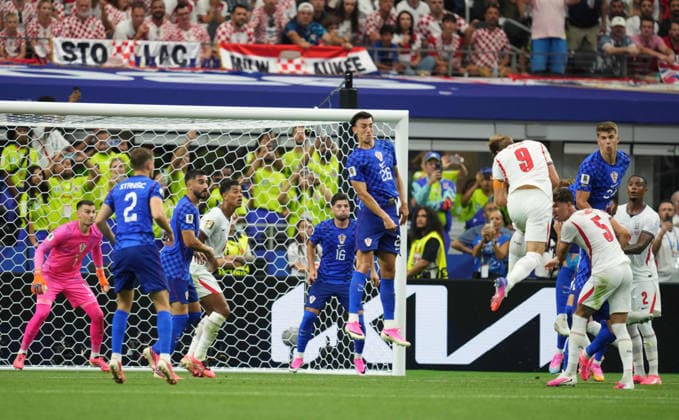 Harry Kane of England scores and celebrates his teams second goal during the match between England and Croatia in Group L of the 2026 FIFA World Cup at Dallas Stadium in Arlington, United States, on June 17, 2026. Photo by Thor Wegner, DeFodi Images,detected_source_language