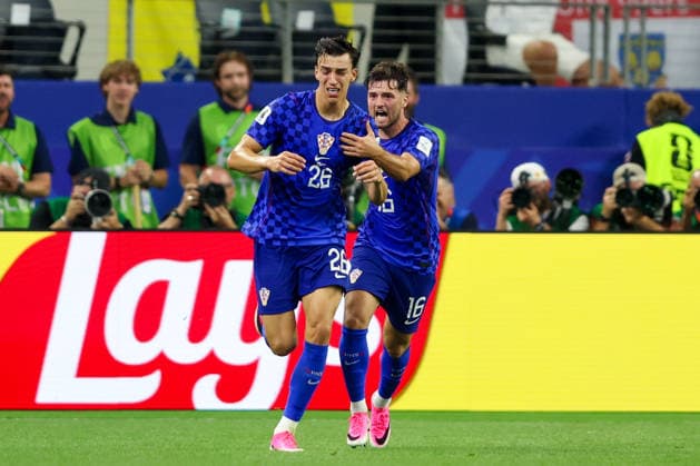 England v Croatia: Group L - FIFA World Cup, WM, Weltmeisterschaft, Fussball 2026 Martin Baturina and Petar Musa of Croatia celebrate after Petar Musa of Croatia scores a goal for 2:2 during the FIFA World Cup 2026 Group L match between England and Croatia at Dallas Stadium on June 17, 2026 in Dallas, Texas.  SanjinxStrukic PIXSELL