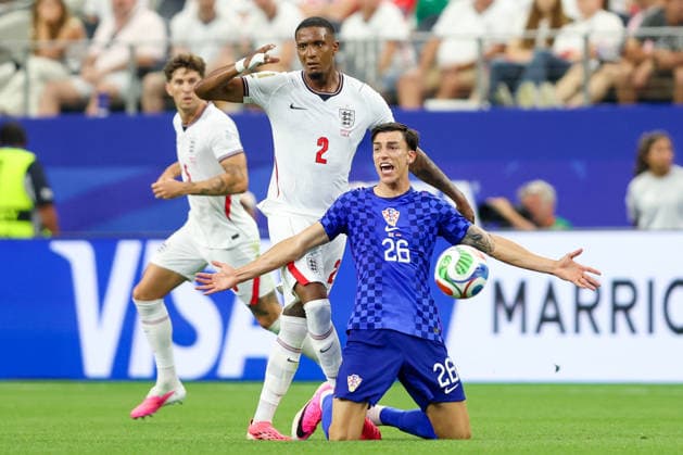 England v Croatia: Group L - FIFA World Cup, WM, Weltmeisterschaft, Fussball 2026 Ezri Konsa of England and Petar Musa of Croatia during the FIFA World Cup 2026 Group L match between England and Croatia at Dallas Stadium on June 17, 2026 in Dallas, Texas.  SanjinxStrukic PIXSELL