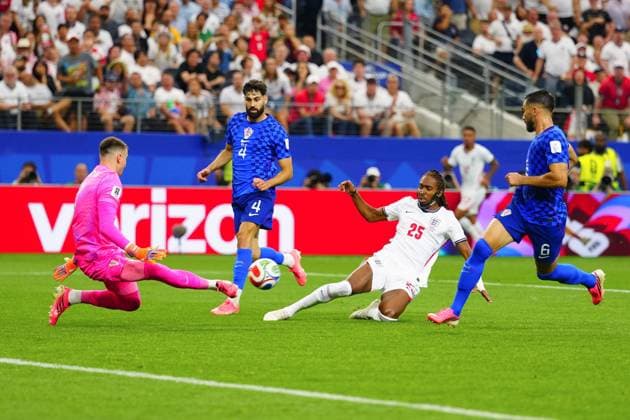 Dominik Livakovic of Croatia saves from Djed Spence of England England v Croatia, 2026 FIFA World Cup, WM, Weltmeisterschaft, Fussball Group L, Football, Dallas Stadium, Arlington, Texas, USA - 17 Jun 2026Arlington Dallas Stadium Texas (TX) United States of America EDITORIAL USE ONLY No use with unauthorised audio, video, data, fixture lists, club league logos or live services. Online in-match use limited to 120 images, no video emulation. No use in betting, games or single club league player publications.  Copyright: xJavierxGarcia Shutterstockx 16928920dt