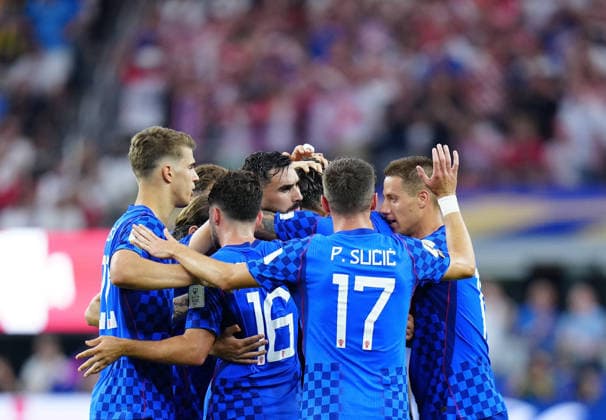 (260618) -- DALLAS, June 18, 2026 -- Players of Croatia celebrate their second goal during the group L match between England and Croatia at the 2026 FIFA World Cup, WM, Weltmeisterschaft, Fussball at the Dallas Stadium in Dallas, the United States, on June 17, 2026. ) (SP)U.S.-DALLAS-FOOTBALL-FIFA WORLD CUP-GROUP L-ENG VS CRO JiaxHaocheng 