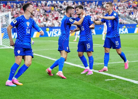 (260618) -- DALLAS, June 18, 2026 -- Players of Croatia celebrate their first goal by Martin Baturina (2nd R) during the group L match between England and Croatia at the 2026 FIFA World Cup, WM, Weltmeisterschaft, Fussball at the Dallas Stadium in Dallas, the United States, on June 17, 2026. ) (SP)U.S.-DALLAS-FOOTBALL-FIFA WORLD CUP-GROUP L-ENG VS CRO JiaxHaocheng 