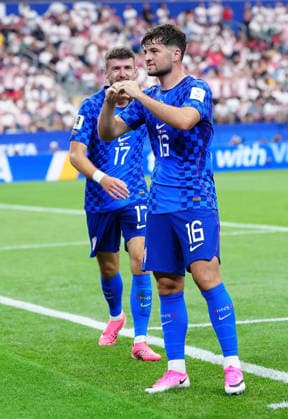 (260618) -- DALLAS, June 18, 2026 -- Martin Baturina (front) of Croatia celebrates his goal during the group L match between England and Croatia at the 2026 FIFA World Cup, WM, Weltmeisterschaft, Fussball at the Dallas Stadium in Dallas, the United States, on June 17, 2026. ) (SP)U.S.-DALLAS-FOOTBALL-FIFA WORLD CUP-GROUP L-ENG VS CRO JiaxHaocheng 