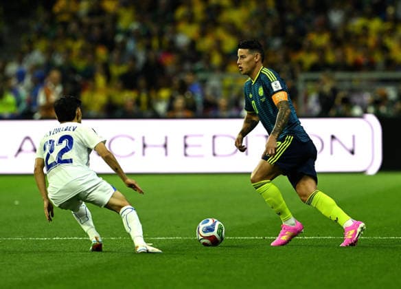 (260618) -- MEXICO CITY, June 18, 2026 -- James Rodriguez (R) of Colombia vies with Abbosbek Fayzullaev of Uzbekistan during the group K match between Uzbekistan and Colombia at the FIFA World Cup, WM, Weltmeisterschaft, Fussball 2026 in Mexico City, Mexico, June 17, 2026. ) (SP)MEXICO-MEXICO CITY-FOOTBALL-FIFA WORLD CUP-GROUP K-UZB VS COL WuxWei 
