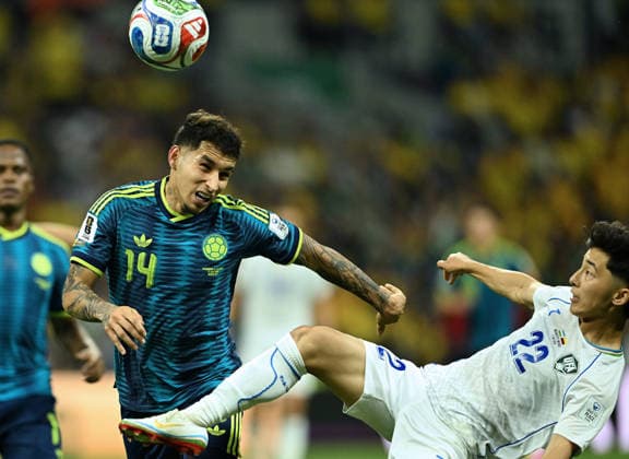 (260618) -- MEXICO CITY, June 18, 2026 -- Abbosbek Fayzullaev (R) of Uzbekistan vies with Gustavo Puerta of Colombia during the group K match between Uzbekistan and Colombia at the FIFA World Cup, WM, Weltmeisterschaft, Fussball 2026 in Mexico City, Mexico, June 17, 2026. ) (SP)MEXICO-MEXICO CITY-FOOTBALL-FIFA WORLD CUP-GROUP K-UZB VS COL WuxWei 
