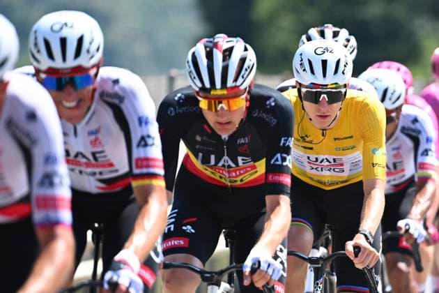 Tour de Suisse 2026 Stage 2 LOCARNO, SWITZERLAND - JUNE 18 : Politt Nils (GER) of UAE Team Emirates - XRG, Wellens Tim (BEL) of UAE Team Emirates - XRG, Pogacar Tadej (SLO) of UAE Team Emirates - XRG during stage 2 of the 89th edition of Tour de Suisse an UCI World Tour 2.UWT cycling road race stage for Men Elite of 157.7 km with start in Locarno and finish in Locarno on June 18, 2026 in Locarno, Switzerland, 18 06 2026 ( Motordriver Guy De Vuyst - Locarno Switzerland  Copyright: xVincentxKalutx