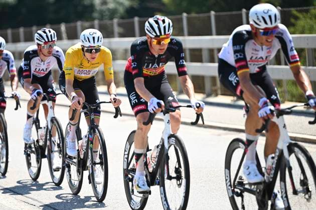 Tour de Suisse 2026 Stage 2 LOCARNO, SWITZERLAND - JUNE 18 : Politt Nils (GER) of UAE Team Emirates - XRG, Wellens Tim (BEL) of UAE Team Emirates - XRG, Pogacar Tadej (SLO) of UAE Team Emirates - XRG during stage 2 of the 89th edition of Tour de Suisse an UCI World Tour 2.UWT cycling road race stage for Men Elite of 157.7 km with start in Locarno and finish in Locarno on June 18, 2026 in Locarno, Switzerland, 18 06 2026 ( Motordriver Guy De Vuyst - Locarno Switzerland  Copyright: xVincentxKalutx