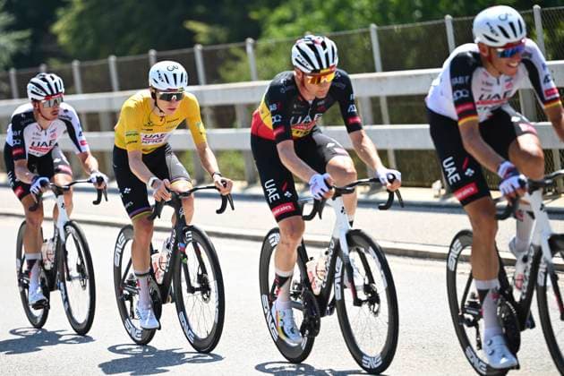 Tour de Suisse 2026 Stage 2 LOCARNO, SWITZERLAND - JUNE 18 : Politt Nils (GER) of UAE Team Emirates - XRG, Wellens Tim (BEL) of UAE Team Emirates - XRG, Pogacar Tadej (SLO) of UAE Team Emirates - XRG during stage 2 of the 89th edition of Tour de Suisse an UCI World Tour 2.UWT cycling road race stage for Men Elite of 157.7 km with start in Locarno and finish in Locarno on June 18, 2026 in Locarno, Switzerland, 18 06 2026 ( Motordriver Guy De Vuyst - Locarno Switzerland  Copyright: xVincentxKalutx