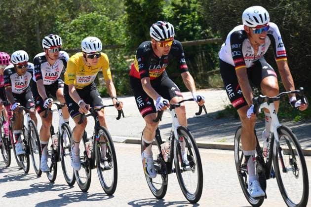 Tour de Suisse 2026 Stage 2 LOCARNO, SWITZERLAND - JUNE 18 : Politt Nils (GER) of UAE Team Emirates - XRG, Wellens Tim (BEL) of UAE Team Emirates - XRG, Pogacar Tadej (SLO) of UAE Team Emirates - XRG during stage 2 of the 89th edition of Tour de Suisse an UCI World Tour 2.UWT cycling road race stage for Men Elite of 157.7 km with start in Locarno and finish in Locarno on June 18, 2026 in Locarno, Switzerland, 18 06 2026 ( Motordriver Guy De Vuyst - Locarno Switzerland  Copyright: xVincentxKalutx