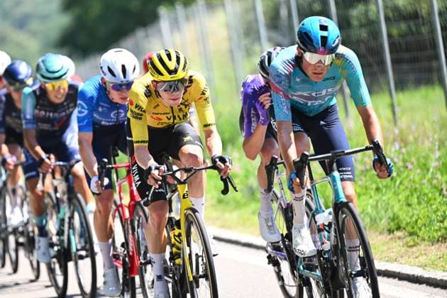 Tour de Suisse 2026 Stage 2 LOCARNO, SWITZERLAND - JUNE 18 : Schrettl Marco (AUT) of XDS Astana Team, Lemmen Bart (NED) of Team Visma Lease a Bike during stage 2 of the 89th edition of Tour de Suisse an UCI World Tour 2.UWT cycling road race stage for Men Elite of 157.7 km with start in Locarno and finish in Locarno on June 18, 2026 in Locarno, Switzerland, 18 06 2026 ( Motordriver Guy De Vuyst - Locarno Switzerland  Copyright: xVincentxKalutx
