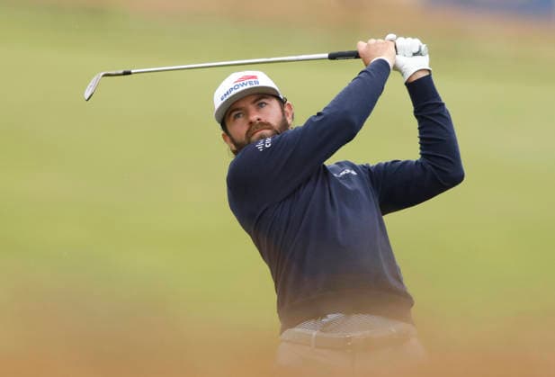 Cameron Young hits an approach shot to the 1st green during the first round of the 126th U.S. Open Golf Championship at Shinnecock Hills Golf Club in Southampton, NY, on Thursday, June 18, 2026.  NYC20260618812 JOHNxANGELILLO