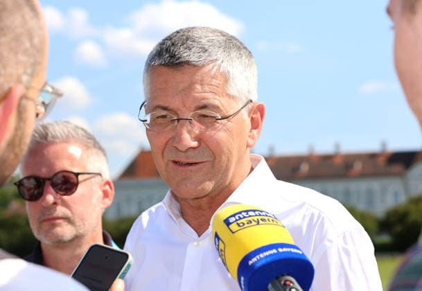 Press event held as part of the invitation extended by the leading Olympic federations to present the detailed bid proposal, Munich Olympic Bid, Nymphenburg Palace. Pictured here is Herbert Hainer, President of FC Bayern Munich, during an interview.,detected_source_language