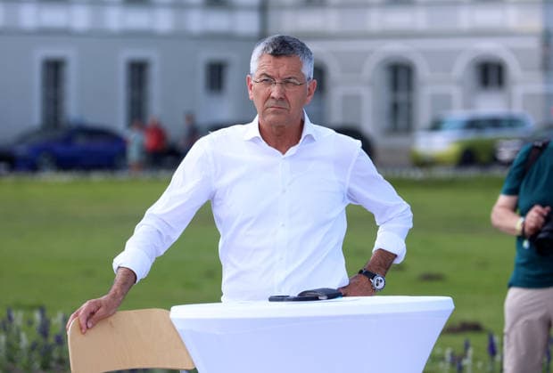 Press event held as part of the invitation extended by the leading Olympic federations to present the detailed bid proposal, Munich Olympic Bid, Nymphenburg Palace. Pictured here is Herbert Hainer, president of FC Bayern Munich, standing, deep in thought, looking pensive, lost in thought.,detected_source_language