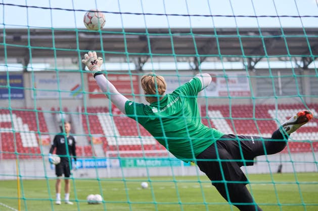 Goalkeeper Moritz Schulze in action at the start of training, Hallescher FC, soccer, Northeast Regional League, 2026–27 season, June 18, 2026, Halle Leuna Chemie Stadium, ST Deutschland,detected_source_language