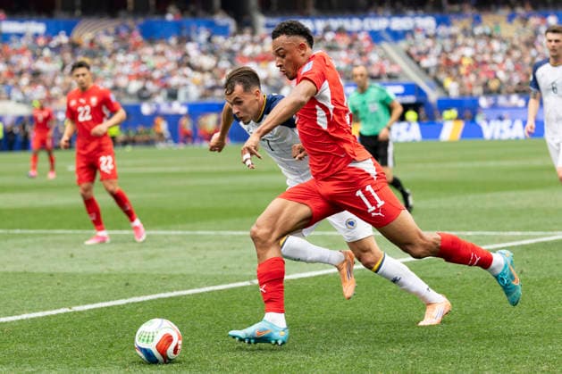 June 18, 2026, Los Angeles, California, USA: Switzerland Ruben Vargas (11) in actions against Bosnia and Herzegovina Amar Dedic (7) during the FIFA World Cup, WM, Weltmeisterschaft, Fussball Group B soccer match at SoFi Stadium in Inglewood, Calif., Thursday, June 18, 2026. World Cup 2026: Switzerland Vs Bosnia And Herzegovina  - ZUMAc68_ 20260618_zaf_c68_022 Copyright: xRingoxChiux