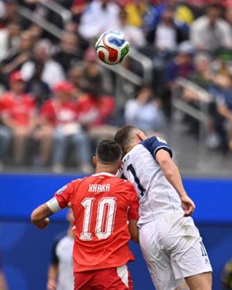 Switzerland v Bosnia and Herzegovina - FIFA World Cup, WM, Weltmeisterschaft, Fussball 2026 - Group B LOS ANGELES, UNITED STATES - JUNE 18: Granit Xhaka (10) of Switzerland in action against Edin Dzeko (R) of Bosnia and Herzegovina during the 2026 FIFA World Cup First Stage Group B match between Switzerland and Bosnia and Herzegovina at the Los Angeles Stadium (SoFi Stadium) in Inglewood, California, United States on June 18, 2026. Tayfun Coskun Anadolu California United States. Editorial use only. Please get in touch for any other usage.  Copyright: x2026xAnadoluxTayfunxCoskunx