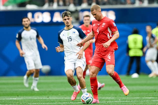 Nico Elvedi of Switzerland (R) runs with the ball under pressure from Kerim Alajbegovic of Bosnia and Herzegovina (L) during a FIFA Men’s World Cup 2026 Group Stage football match between Switzerland and Bosnia and Herzegovina at Los Angeles Stadium, in Inglewood on June 18th 2026 (Photo by Nayra Halm SPP)  Copyright: xNayraxHalm SPPx Sportspressphoto_SPR170032