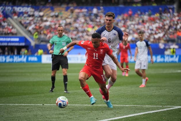 Switzerland v Bosnia and Herzegovina - FIFA World Cup, WM, Weltmeisterschaft, Fussball 2026 - Group B LOS ANGELES, UNITED STATES - JUNE 18: Dan Ndoye of Switzerland in action against Benjamin Tahirovic of Bosnia and Herzegovina reacts during the 2026 FIFA World Cup First Stage Group B match between Switzerland and Bosnia and Herzegovina at the Los Angeles Stadium (SoFi Stadium) in Inglewood, California, United States on June 18, 2026. Tayfun Coskun Anadolu California United States. Editorial use only. Please get in touch for any other usage.  Copyright: x2026xAnadoluxTayfunxCoskunx