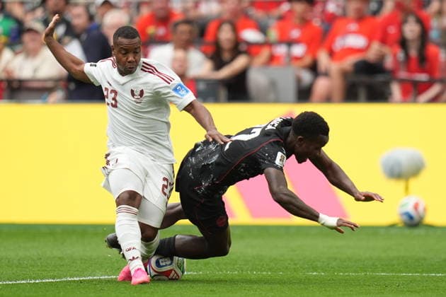 Canada v Qatar - FIFA World Cup, WM, Weltmeisterschaft, Fussball 2026 - Group B VANCOUVER, CANADA - JUNE 18: Assim Madibo (23) of Qatar in action against Richie Laryea (22) of Canada during the 2026 FIFA World Cup First Stage Group B match between Canada and Qatar at BC Place Stadium in Vancouver, Canada on June 18, 2026. Ercin Erturk Anadolu British Columbia Canada. Editorial use only. Please get in touch for any other usage.  Copyright: x2026xAnadoluxErcinxErturkx