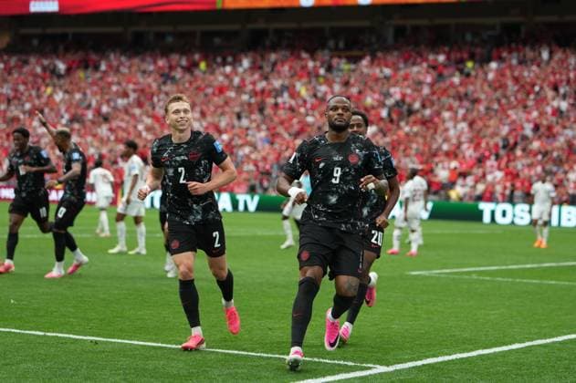 Canada v Qatar - FIFA World Cup, WM, Weltmeisterschaft, Fussball 2026 - Group B VANCOUVER, CANADA - JUNE 18: Cyle Larin (9) of Canada celebrates after scoring a goal during the 2026 FIFA World Cup First Stage Group B match between Canada and Qatar at BC Place Stadium in Vancouver, Canada on June 18, 2026. Ercin Erturk Anadolu British Columbia Canada. Editorial use only. Please get in touch for any other usage.  Copyright: x2026xAnadoluxErcinxErturkx