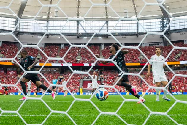 FIFA World Cup, WM, Weltmeisterschaft, Fussball 2026 - Group B - Canada vs Qatar Canada forward Cyle Larin (R) and midfielder Ali Ahmed (L) celebrate with forward Jonathan David after David scored during the FIFA World Cup 2026 group stage match between Canada and Qatar in Vancouver, Canada, 18 June 2026. VANCOUVER Canada  Copyright: xBOBxFRIDx