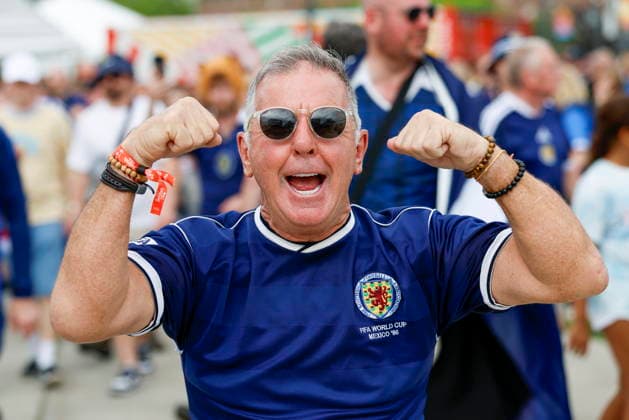 The Scotland fans Tartan Army march to support their team during the 2026 FIFA World Cup, WM, Weltmeisterschaft, Fussball A fan of Scotland cheers during the Tartan Army Downtown March in Providence, Rhode Island, USA, 18 June 2026. Scotland takes on Morocco in a Group C match 19 June at Boston Stadium. PROVIDENCE RHODE ISLAND USA  Copyright: xGREGxM.xCOOPERx