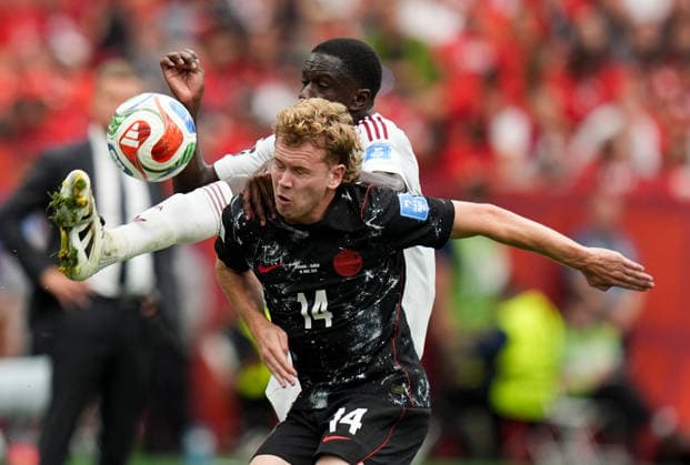 Canada v Qatar - FIFA World Cup, WM, Weltmeisterschaft, Fussball 2026 - Group B VANCOUVER, CANADA - JUNE 18: Canada s Jacob Shaffelburg (14) battles for the ball with an opponent during the 2026 FIFA World Cup Group B match between Canada and Qatar at BC Place Stadium in Vancouver, Canada, on June 18, 2026. Ercin Erturk Anadolu Vancouver Canada. Editorial use only. Please get in touch for any other usage.  Copyright: x2026xAnadoluxErcinxErturkx