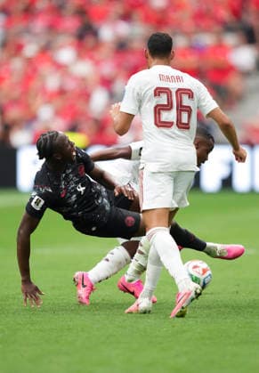 (260619) -- VANCOUVER, June 19, 2026 -- Ismael Kone (L) of Canada vies with Assim Madibo (behind) of Qatar during the group B match between Canada and Qatar at the 2026 FIFA World Cup, WM, Weltmeisterschaft, Fussball at BC Place Vancouver in Vancouver, Canada, June 18, 2026. ) (SP)CANADA-VANCOUVER-FOOTBALL-FIFA WORLD CUP-GROUP B-CAN VS QAT MengxYongmin 