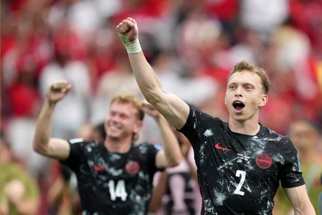 (260619) -- VANCOUVER, June 19, 2026 -- Alistair Johnston (R) of Canada celebrates after the group B match between Canada and Qatar at the 2026 FIFA World Cup, WM, Weltmeisterschaft, Fussball at BC Place Vancouver in Vancouver, Canada, June 18, 2026. ) (SP)CANADA-VANCOUVER-FOOTBALL-FIFA WORLD CUP-GROUP B-CAN VS QAT MengxYongmin 