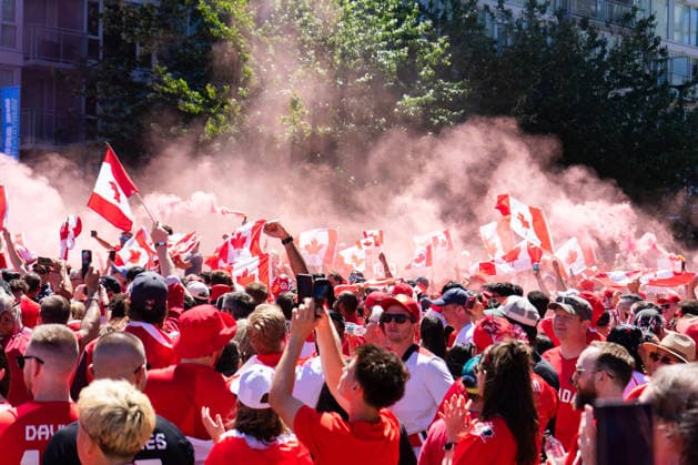 VANCOUVER, CANADA - JUNE 18: Thousands of fan supporters of Canada gather while red colored smoke is released during the March to the Match Rally before the FIFA World Cup, WM, Weltmeisterschaft, Fussball 2026 group stage match between Canada and Qatar at the Match Day Spectator Route between Main Street-Science World Station and BC Place Vancouver Stadium on June 18, 2026 in Vancouver, British Columbia, Canada.  Copyright: xAmyxElle SPPx Sportspressphoto_SPR170386