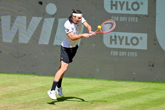 Taylor Fritz (USA) hits a backhand at the TERRA WORTMANN Open 2026, Tennis, ATP, Mens 500, Tournament, Main Draw, Quarterfinals, June 19, 2026, TERRA WORTMANN Open 2026, Tennis, ATP, Mens 500, Tournament, Main Draw, Quarterfinals, June 19, 2026, Halle,detected_source_language Copyright: xEibner-Pressefoto RobertxGertzenx EP_RGN