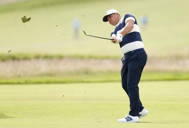 Gary Woodland hits an approach shot on the 1st fairway during the second round of the 126th U.S. Open Golf Championship at Shinnecock Hills Golf Club in Southampton, NY, on Friday, June 19, 2026.  NYC20260619803 JOHNxANGELILLO