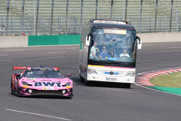 Track Safari - Matteo Cairoli (I Emil Frey Racing 14), Ferrari 296 GT3 Evo Overtakes coach with spectators, DTM (German Touring Car Championship) - Round 3 - Free Practice, DEKRA Lausitzring on 19.06.2026. Brandenburg Deutschland Copyright: xO.Frankex