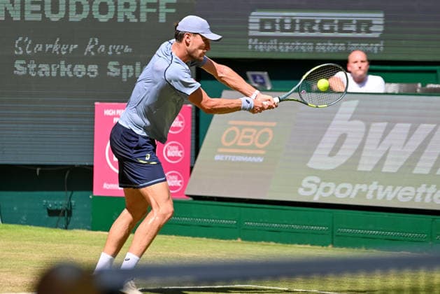 Raphael Collignon (BEL) hits a backhand at the TERRA WORTMANN Open 2026, Tennis, ATP, Mens 500, Tournament, Main Draw, Quarterfinals, June 19, 2026, TERRA WORTMANN Open 2026, Tennis, ATP, Mens 500, Tournament, Main Draw, Quarterfinals, June 19, 2026, Halle,detected_source_language Copyright: xEibner-Pressefoto RobertxGertzenx EP_RGN
