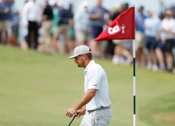 Bryson DeChambeau reacts after putting on the 9th green during the second round of the 126th U.S. Open Golf Championship at Shinnecock Hills Golf Club in Southampton, NY, on Friday, June 19, 2026.  NYC20260619829 JOHNxANGELILLO