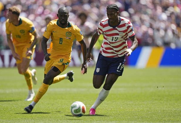 FIFA World Cup, WM, Weltmeisterschaft, Fussball 2026 - Group D - USA vs Australia Jason Geria of Australia (L) and Haji Wright of USA in action during the FIFA World Cup 2026 group stage match USA against Australia, in Seattle, USA, 19 June 2026. SEATTLE United States  Copyright: xSTEPHANxBRASHEARx
