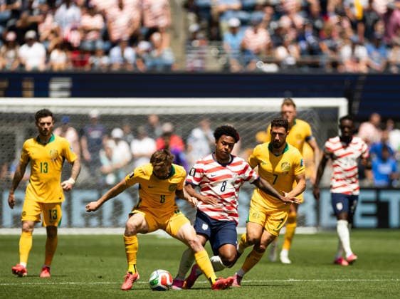 SEATTLE, WASHINGTON - JUNE 19: Weston McKennie of United States battles for the ball with Connor Metcalfe of Australia during the FIFA World Cup, WM, Weltmeisterschaft, Fussball 2026 Group D match between USA and Australia at Seattle Stadium on June 19, 2026 in Seattle, Washington.  Copyright: xMBxMediax