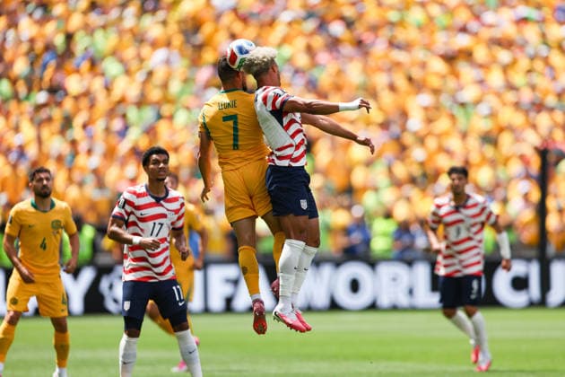 SEATTLE, WA - JUNE 19: Defender Antonee Robinson 5 of the United States and forward Mathew Leckie 7 of Australia jump for the ball during the FIFA World Cup, WM, Weltmeisterschaft, Fussball 2026 Group D match between the USA and Australia on June 19, 2026 at Seattle Stadium in Seattle, Washington. (Photo by Henry Rodenburg Icon Sportswire) SOCCER: JUN 19 FIFA World Cup 26 Group D - USA vs Australia EDITORIAL USE ONLY Icon260619005
