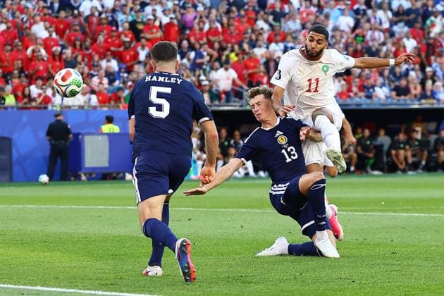 Ismael Saibari of Morocco is tackled by Jack Hendry of Scotland Scotland v Morocco, 2026 FIFA World Cup, WM, Weltmeisterschaft, Fussball Group C, Football, Boston Stadium, Foxborough, Massachusetts, USA - 19 Jun 2026Foxborough Boston Stadium Massachusetts (MA) United States of America EDITORIAL USE ONLY No use with unauthorised audio, video, data, fixture lists, club league logos or live services. Online in-match use limited to 120 images, no video emulation. No use in betting, games or single club league player publications.  Copyright: xMichaelxZemanek Shutterstockx 16928953ci
