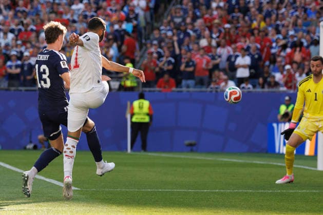 Morocco midfielder Ismael Saibari shoots past Scotland defender Jack Hendry and scores on Scotland goalkeeper Angus Gunn during the first half of their FIFA World Cup, WM, Weltmeisterschaft, Fussball match at Gillette Stadium in Foxborough, Massachusetts, on Friday, June 19, 2026.  BOP20260619016 CJxGUNTHER