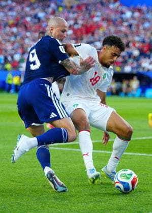 Lyndon Dykes of Scotland and Chadi Riad of Morocco Scotland v Morocco, 2026 FIFA World Cup, WM, Weltmeisterschaft, Fussball Group C, Football, Boston Stadium, Foxborough, Massachusetts, USA - 19 Jun 2026Foxborough Boston Stadium Massachusetts (MA) United States of America EDITORIAL USE ONLY No use with unauthorised audio, video, data, fixture lists, club league logos or live services. Online in-match use limited to 120 images, no video emulation. No use in betting, games or single club league player publications.  Copyright: xJavierxGarcia Shutterstockx 16928932do