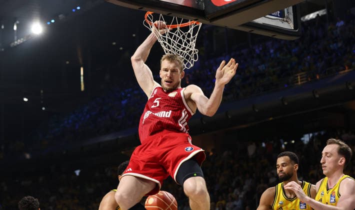 Niels Giffey after a dunk at the basket; Upper-body action; Sports; Basketball; BBL; Bundesliga; Mens; Playoff Final 4; Game; 2025–2026 season; June 19, 2026; ALBA Berlin vs. Bayern Munich,detected_source_language